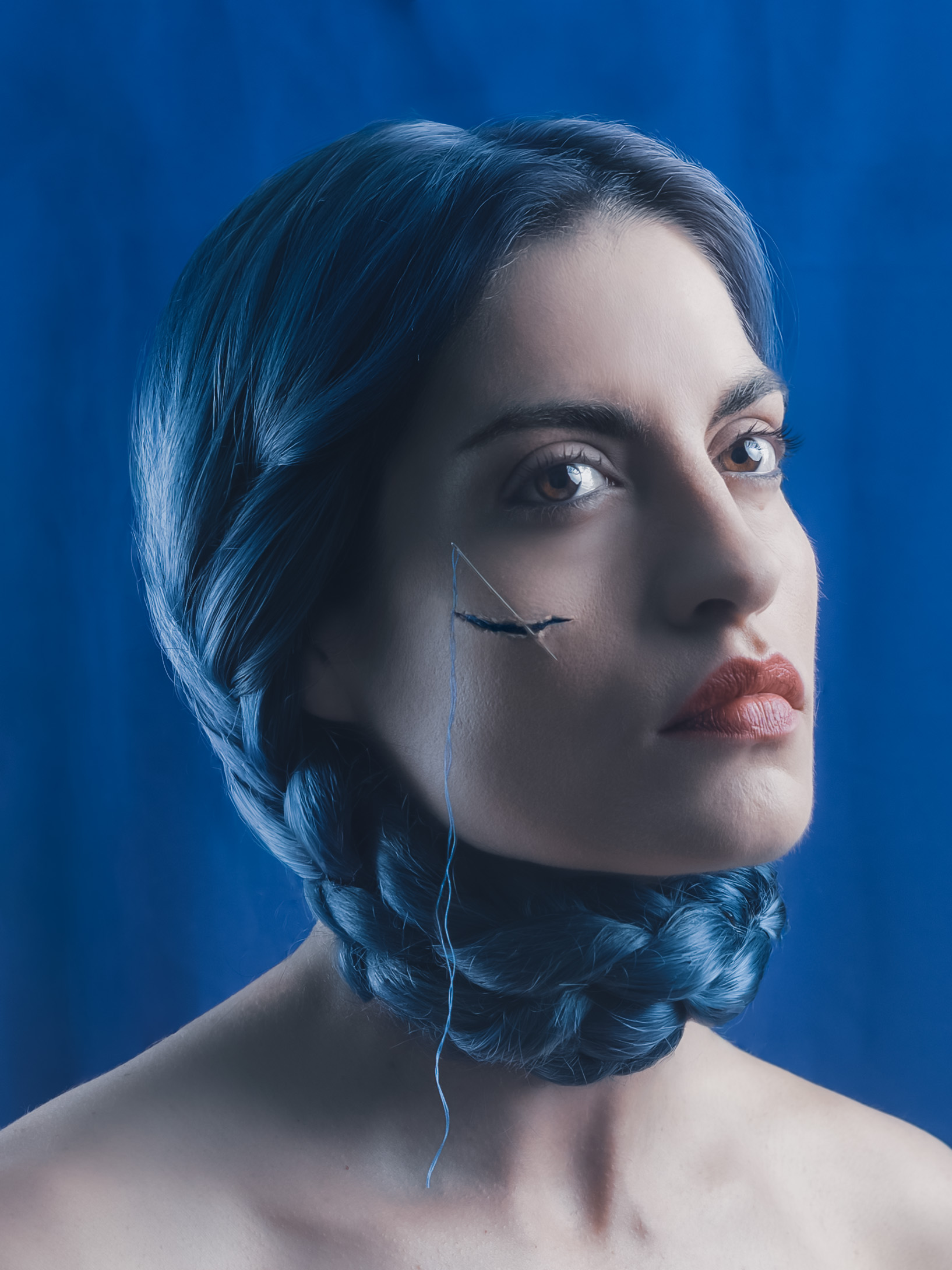 Surreal portrait titled Tethered